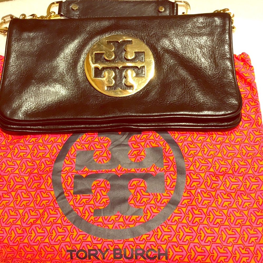 black leather large clutch with golden arm chain